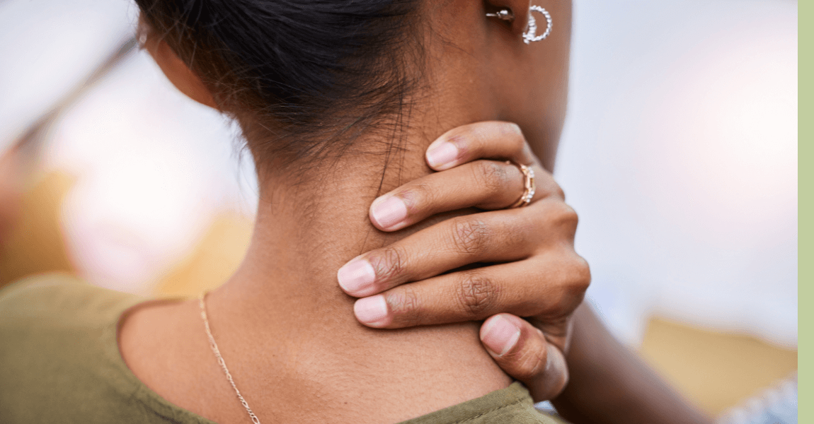person holding neck