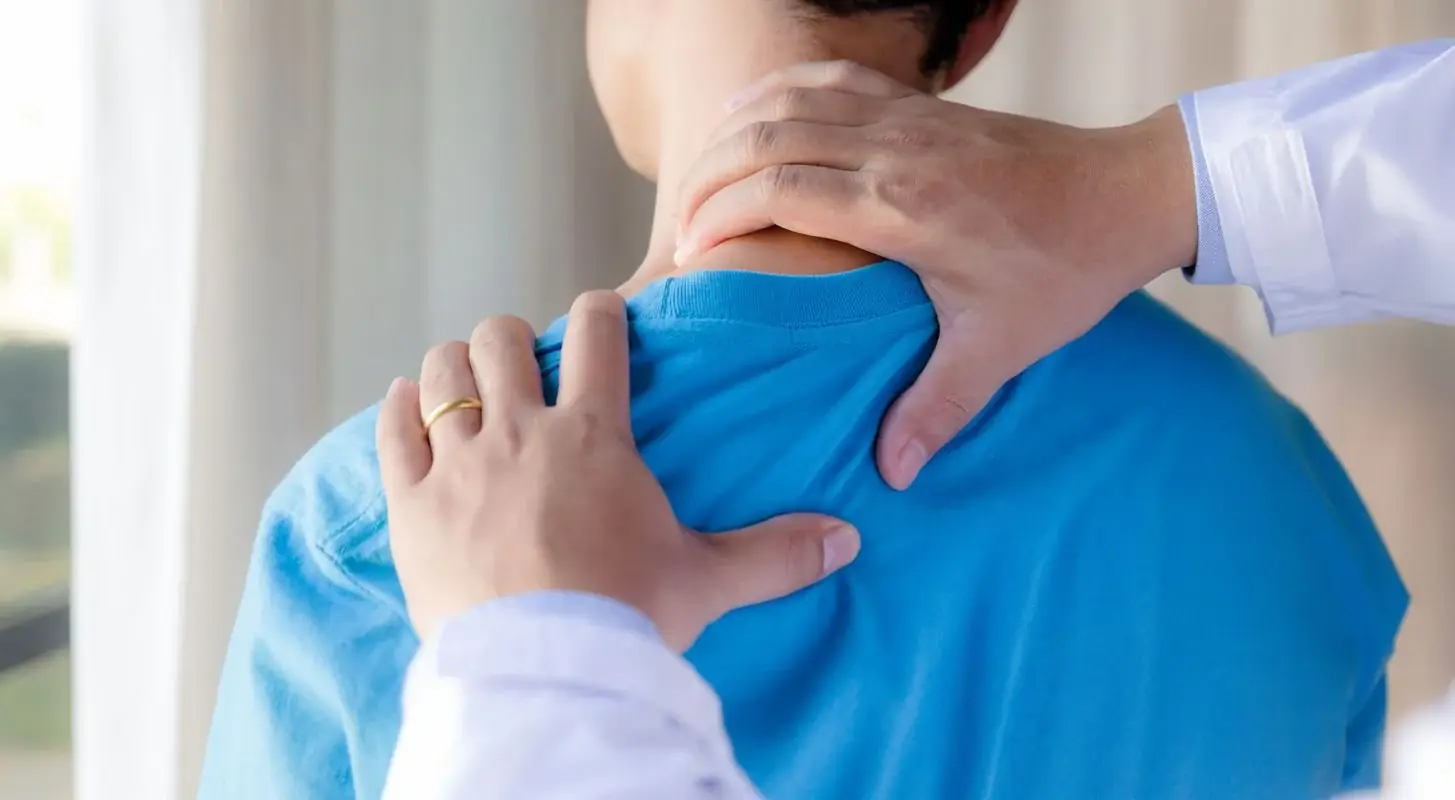 man getting chiropractor adjustment