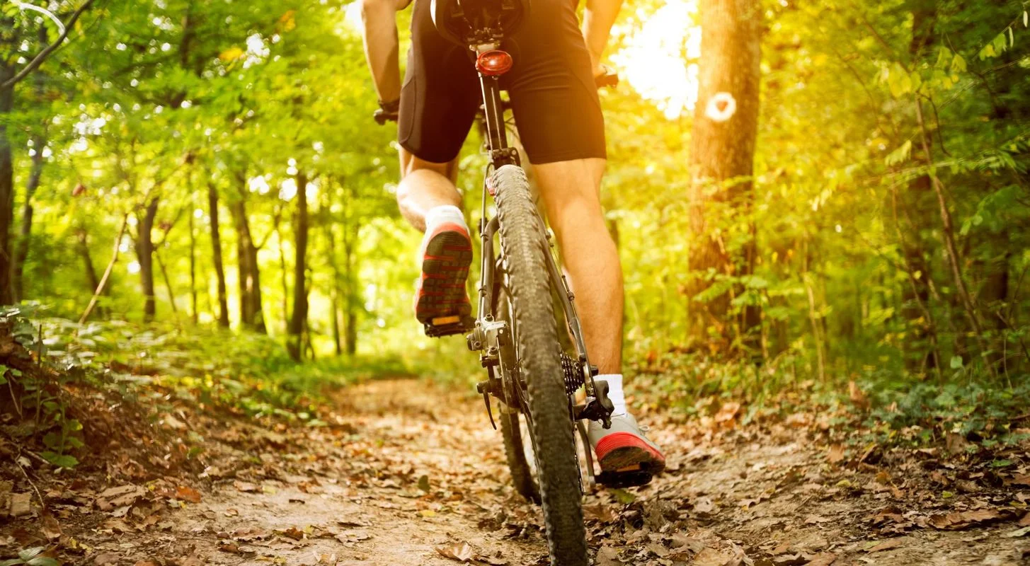 Man biking on a trail